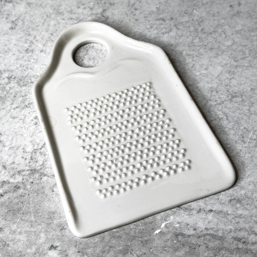 White Ceramic Ginger Garlic Grater Plate Paddle Shape with Hanging Hole 5.5in